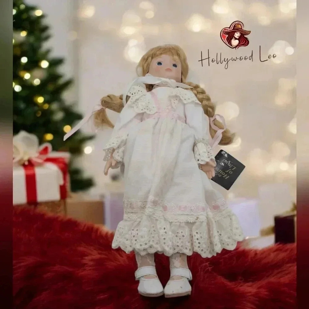House of Lloyd Christmas Around the World Porcelain Doll Faith with Cross 15 in